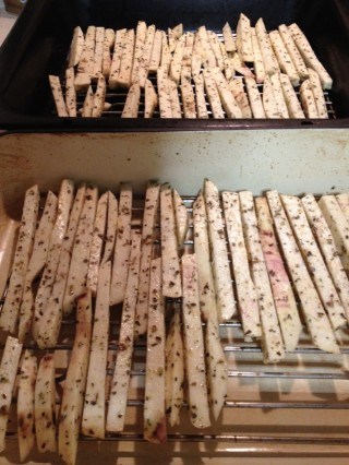 sweet potato crisps laid out for the oven sweet potato crisps laid out for the oven